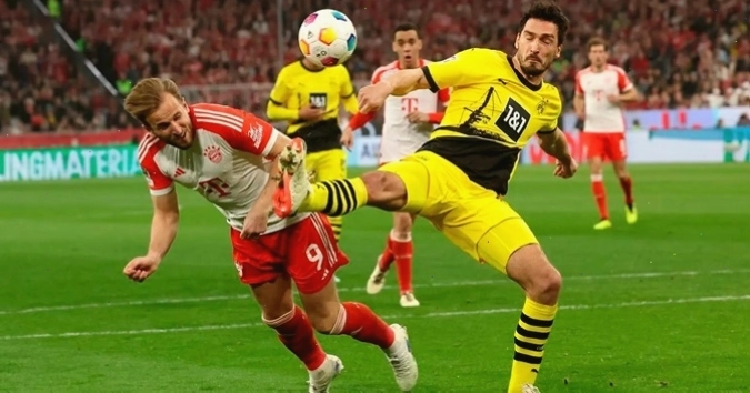 Hummels đối đầu Harry Kane
