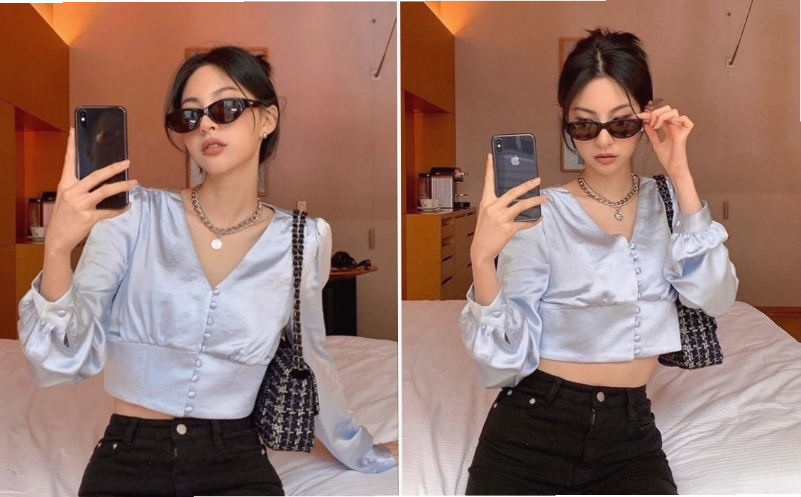 Cô gái check-in phòng khách sạn với ảnh chụp gương
