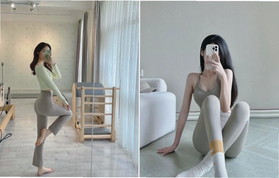 Cô gái khoe dáng trong bộ đồ thể thao khi chụp ảnh trước gương